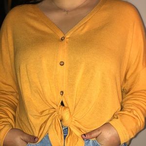 mustard yellow tied blouse
